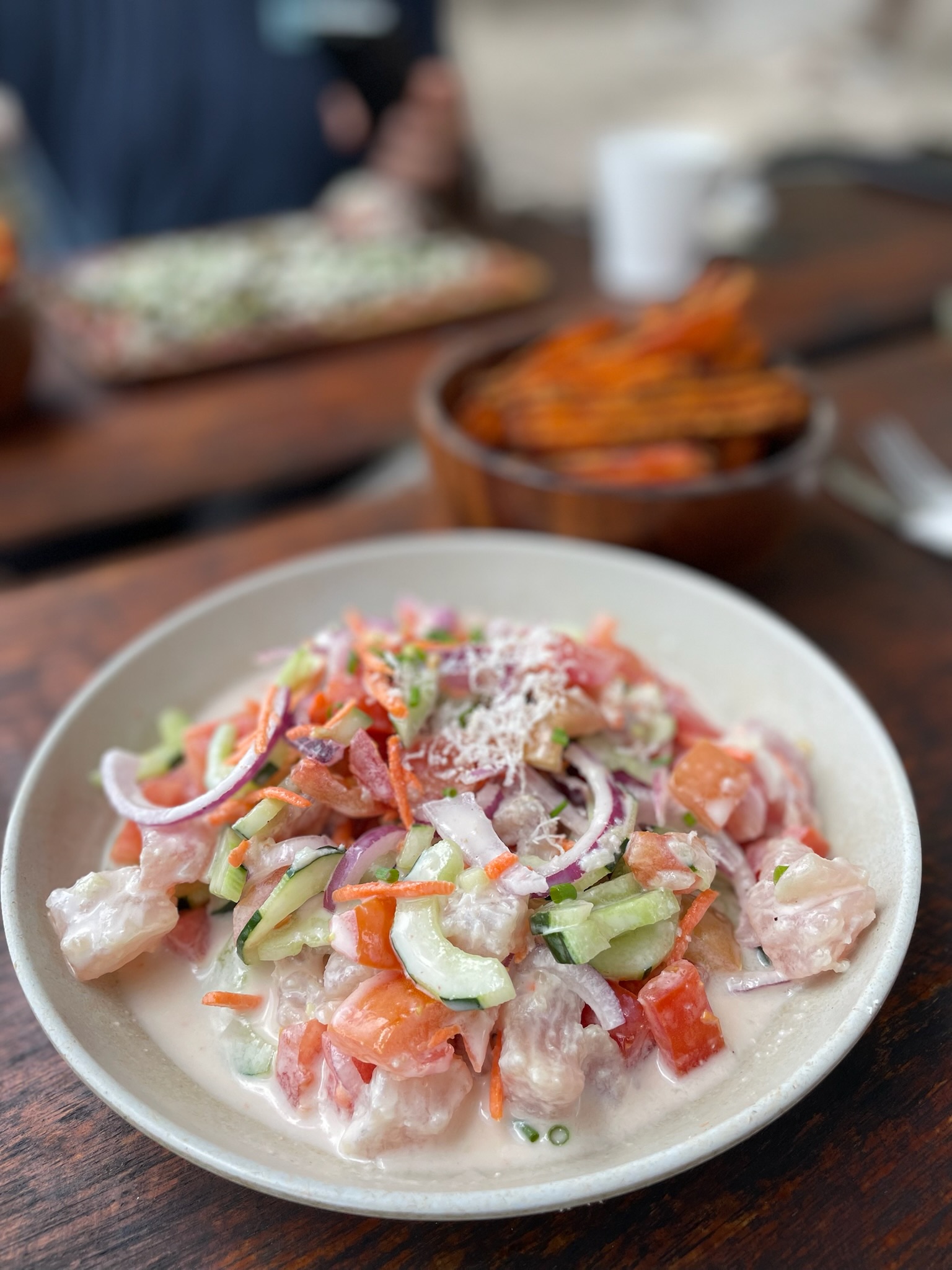 Poisson cru, Tahitian raw fish in coconut milk, at Coco Beach in Moorea