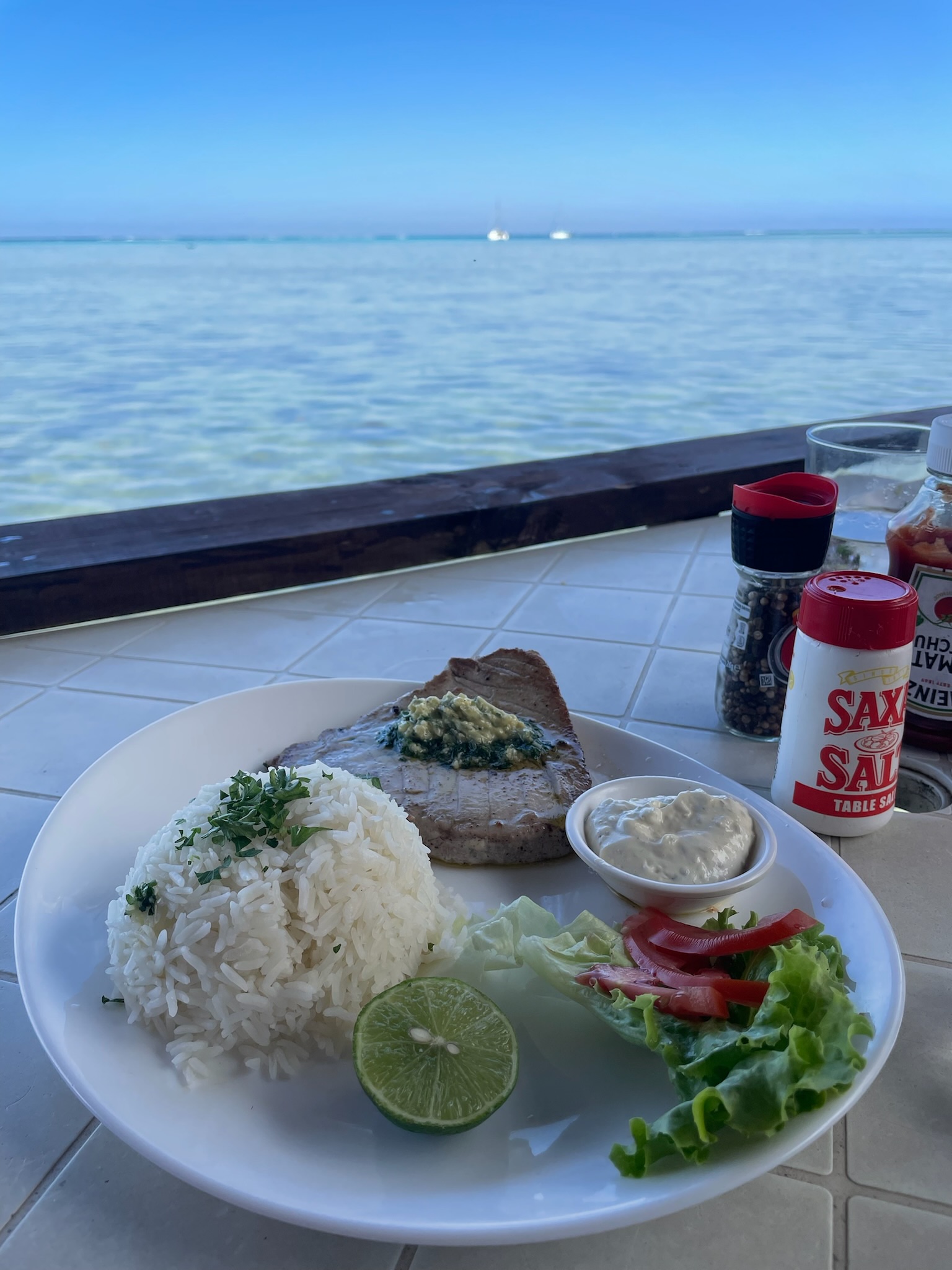 Seared tuna with rice and salad at Snack Mahana, Moorea