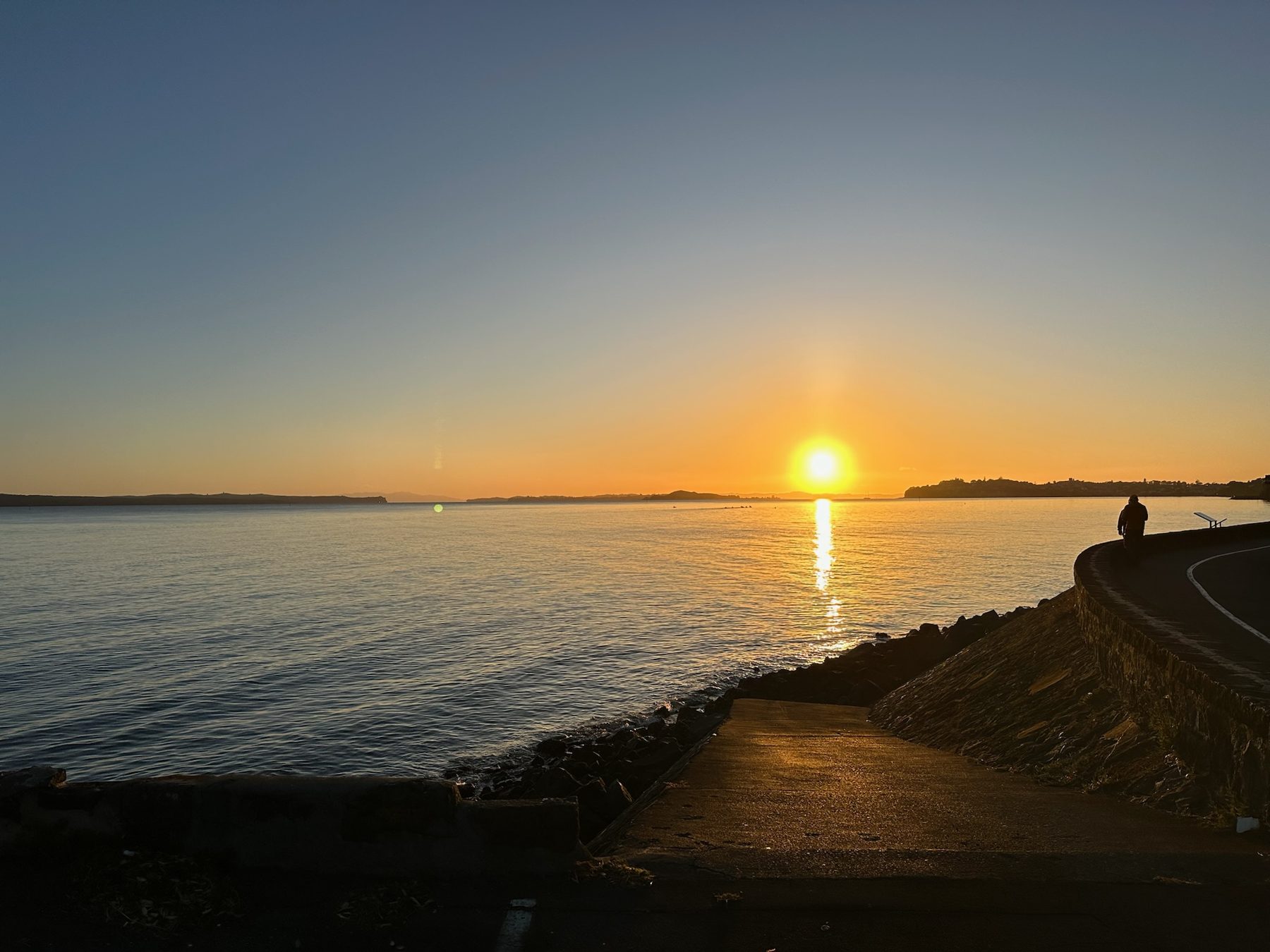 Sunrise over the water in Auckland on our last morning