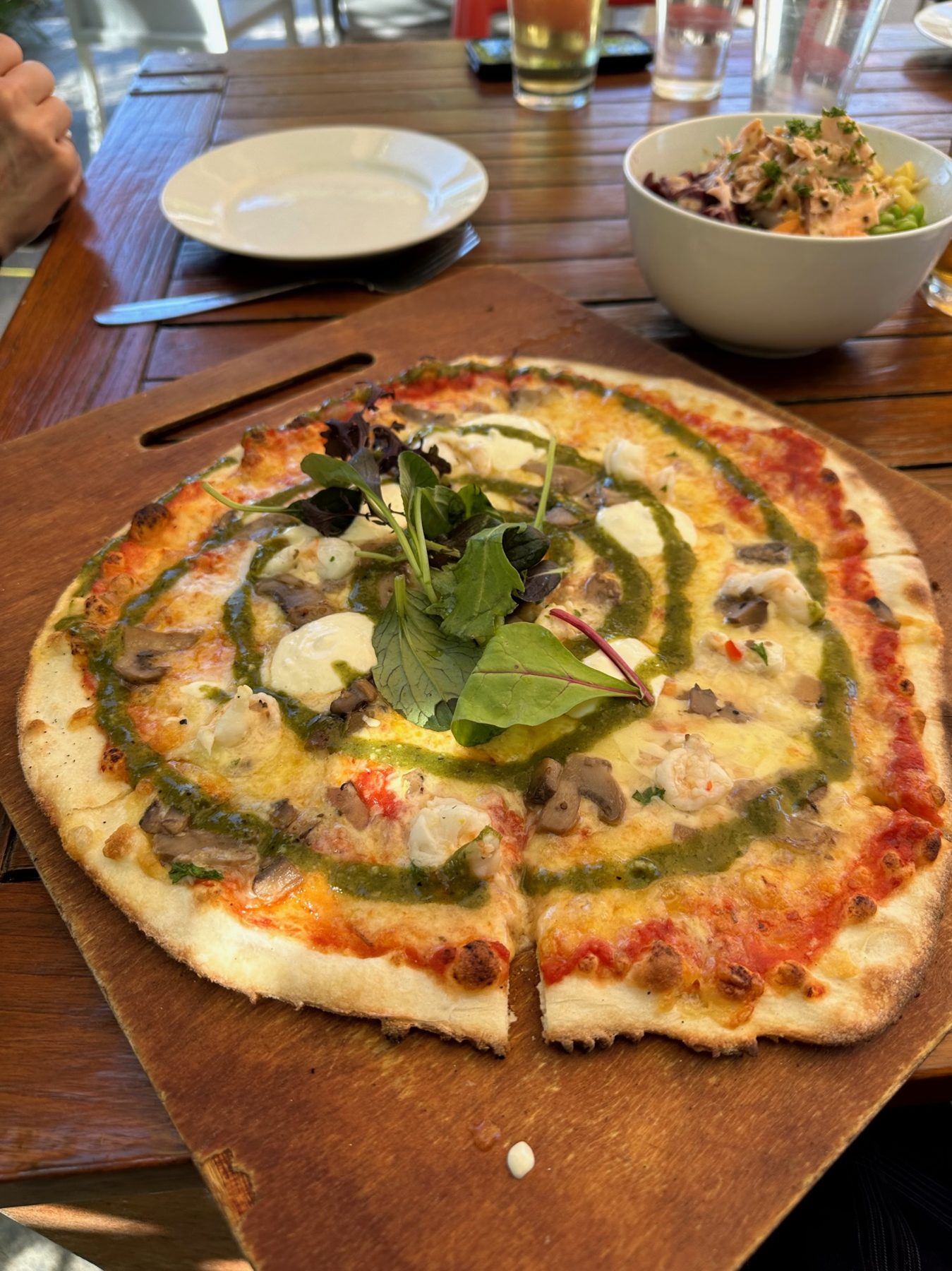 Thin-crust pizza at The Pour House in Hahei